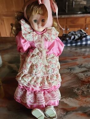 Classic Pink Porcelain Dress-Up Doll with Floral Apron